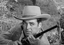 Rory Calhoun as Tate, prepared to put an end to an Indian uprising in Ride Out for Revenge (1957)