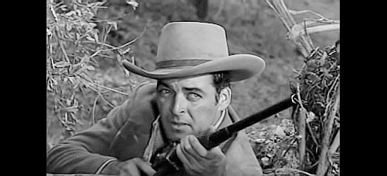 Rory Calhoun as Tate, prepared to put an end to an Indian uprising in Ride Out for Revenge (1957)