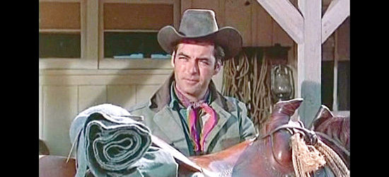 Rory Calhoun as Tex Kirby, about to depart for greener pastures in Raw Edge (1956)