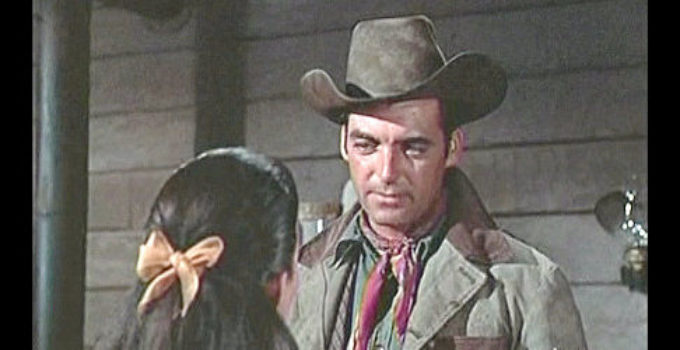 Rory Calhoun as Tex Kirby learns of his brother's fate from Paca in Raw Edge (1956)