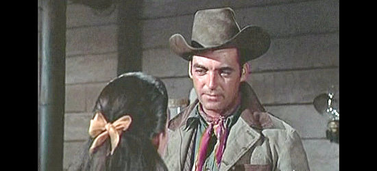 Rory Calhoun as Tex Kirby learns of his brother's fate from Paca in Raw Edge (1956)