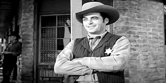 Rory Calhoun as Tom Davison, sheriff and leader of the posse trying to track down the outlaws in The Silver Whip (1953)