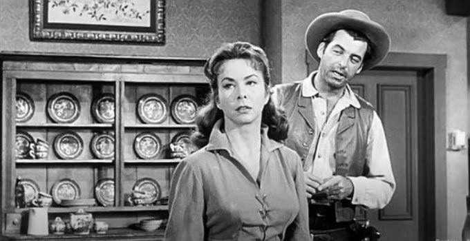 Rory Calhoun as Utah Blaine with Angie Kinyon, one of the landowners he's trying to help in Utah Blaine (1957)