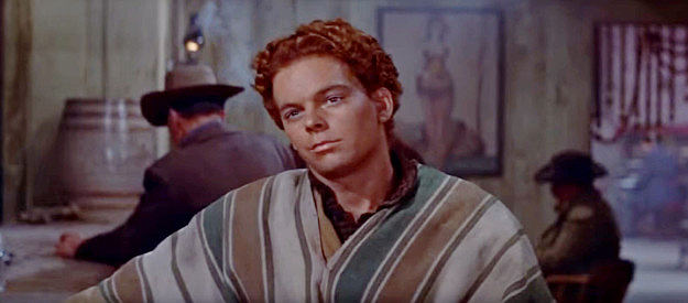 Russ Tamblyn as Jimmy O'Brien, the young half-breed buffalo skinner, finding the nerve to stand up to Charlie Gilson in The Last Hunt (1956)