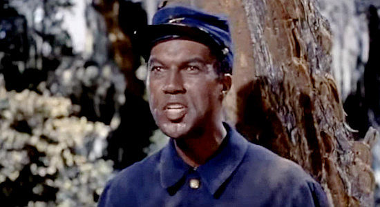 Russell Evans as Jimmee, a former slave helping Hamish escape Union patrols in Band of Angels (1957)