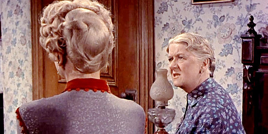 Ruth Donnelly as Molly Higgins, Calem Ware's landlady, sharing what she knows with Tally in A Lawless Street (1955)