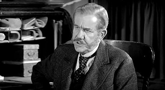 Sam Flint as Mr. Mott, a banker determined to protect his deposits in The Moonlighter (1953)