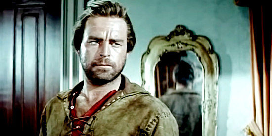 Scott Brady as Sundance, in love with Kit Banion and wary of the newcomer to Rock Springs in The Maverick Queen (1956)