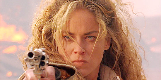 Sharon Stone as Ellen, showing off her six-gun skills in The Quick and the Dead (1995)