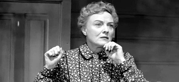 Sheila Bromley as Mrs. Myra Sutter, frantically watching Indians drag off daughter Lynn in The Lawless Eighties (1957)