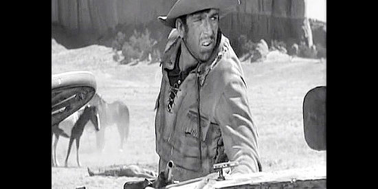 Slim Pickens as Plank, one of the frontiersmen riding with Barstow's Rebel patrol in Rocky Mountain (1950)