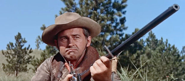 Stewart Granger as Sandy McKenzie, unable to bring himself to kill another buffalo in The Last Hung (1956)