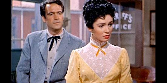Susan Cabot as Laurie Kenyon chides her uncle and fiance (William Pullen as Tom Meredith) in Ride Clear of Diablo (1954)