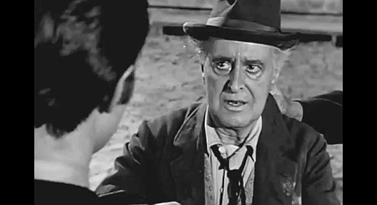Taylor Holmes as Mr. Wren, the town builder turned town drunk who's taken in by Parson Butler in The Peacemaker (1956)