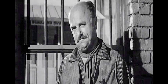 Ted Jacques as Sheriff Ben Maxton, looking for a bank robber who made off with $40,000 from his town in Black Patch (1957)