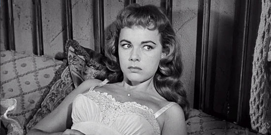 Terry Moore as Janet Calvert, the young girl who's been awaiting Matt Brown's return in Cast a Long Shadow (1959)