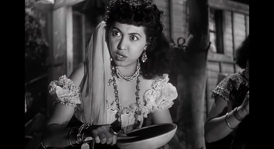 Tina Pine as Rita, a young gypsy woman who takes a liking to James Reavis in The Baron of Arizona (1950)