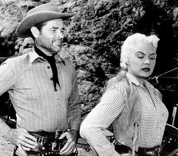 Tom Neal as Arch Clements and Barbara Payton as Kate in The Great Jesse James Raid (1953)