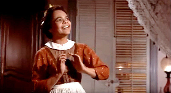 Tommie Moore as Dolly, rejoicing over the rumor that freedom is coming in Band of Angels (1957)