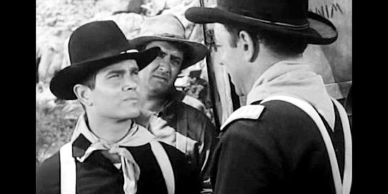 Tommy Cook as Trooper Rogers, being sent to fetch reinforcements by Capt. Dave Storm in Thunder Pass (1954)