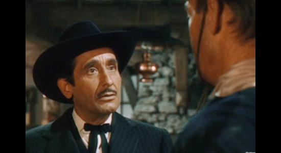 Victor Jory as Frank Walsh, the man who runs the Cariboo region and wants to rule Frances Harrison too in The Cariboo Trail (1950)
