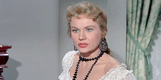 Virginia Mayo as Sally, who convinced Cass SIlver to flee danger once and wants him to again in The Proud Ones (1956)