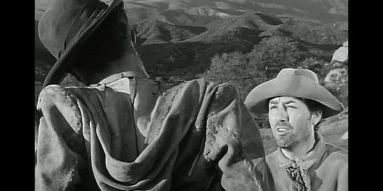 Wally Cassell as Pvt. Danny Zecca, find a colleague tortured and dying in Little Big Horn (1951)