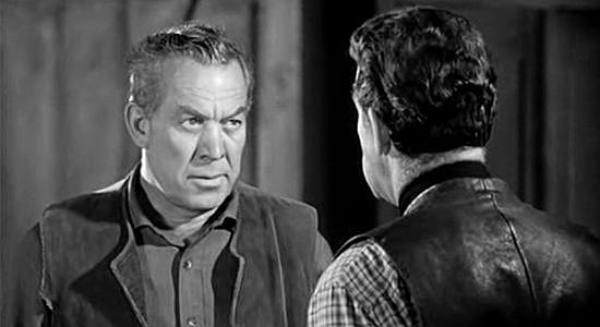 Ward Bond as Cole Gardner in a dispute over bank loot with Wes Anderson in The Moonlighter (1953)