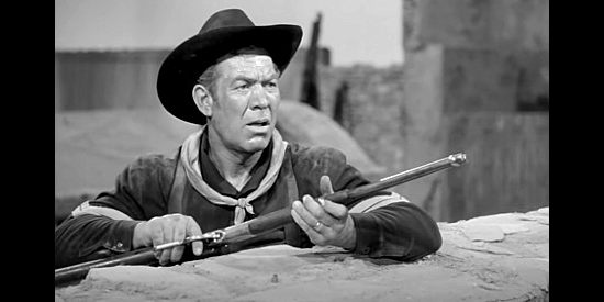 Ward Bond as Cpl. Timothy Gilchrist, waiting for another attack at Fort Invincible in Only the Valiant (1951)