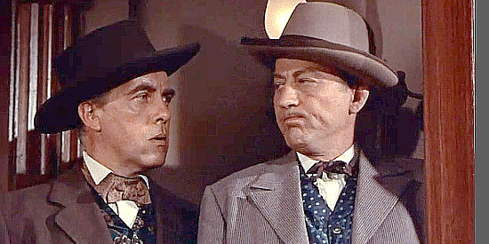 Warner Anderson as Hamer Thorne and John Emery as Cody Clark, fearing their devious plans are falling apart in A Lawless Street (1955)