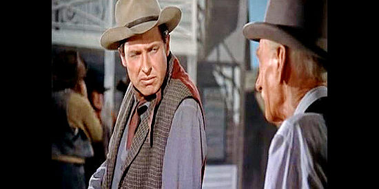 Will Rogers Jr. as Sheriff Tom Brewster, looking for advice from old-timer Pop Pruty (Clem Bevans) in The Boy from Oklahoma (1954)