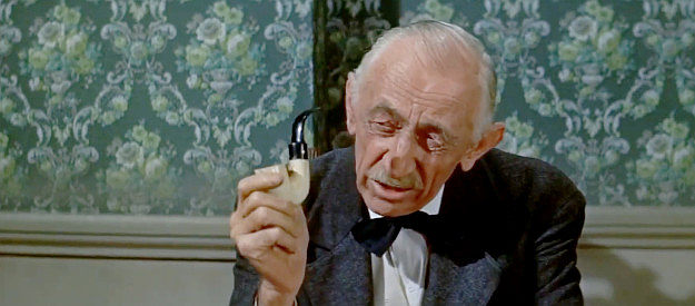 Will Wright as Judge Wood, suspicious of Mike Davis and his motives in Quantrill's Raiders (1958)