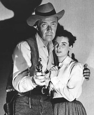 Willard Park as Clint Bannister and Audrey Dalton as Susan Harvey in The Lone Texan (1959)
