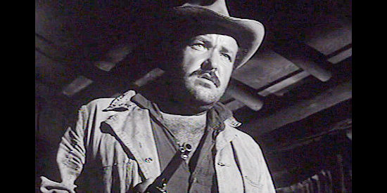 William Conrad as Chris Hamish, having cornered his prey in The Ride Back (1957)
