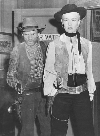 William Fawcett as Alkali and Maria Hart as Queenie Hart in Cattle Queen (1951)