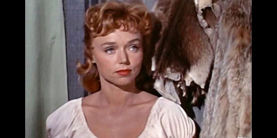 Yvette Vickers as Amelia, the young woman Hemp Brown finds wearing a broach taken during the payroll theft in The Saga of Hemp Brown (1958)