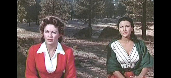 Yvonne De Carlo as Hannah and Mara Corday as Paca, trying to escape Montgomery's law regarding women in Raw Edge (1956)
