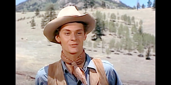 Carleton Carpenter as Hewie, the young cowpoke attracted to Lily Fasken in Vengeance Valley (1951)