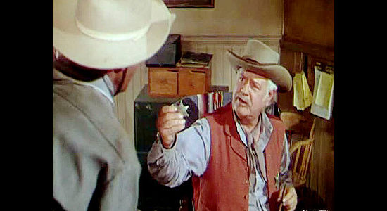 Alan Hale as Sheriff Harris, offering Steve Farrell a deputy's badge, which he accepts, in Colt .45 (1950)
