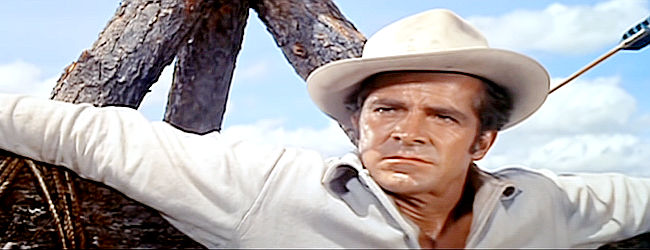 Dana Andrews as Jim Read, a cavalry scout facing slow death in Comanche (1956)