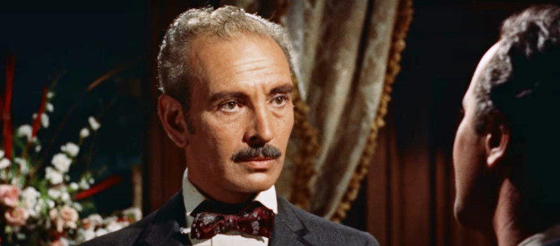 Donald Randolph as Senor Vidal, the father who forbids a relationship between Maria and Frank Harris in Cowboy (1958)