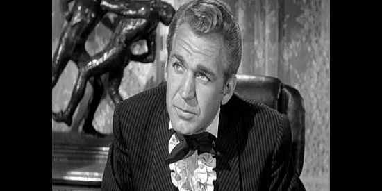 Forrest Tucker as Mike Prescott, trying to convince Ruth Martin that he killed her brother Bob in self defense in California Passage (1950)