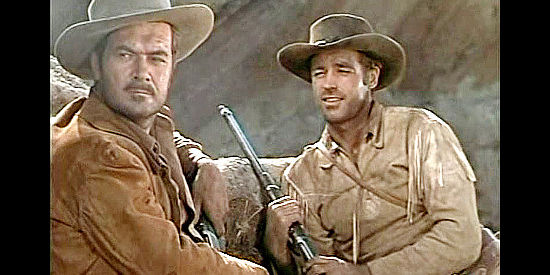 Frank Lovejoy as Sgt. Charlie Baker and Guy Madison as Miles Archer, planning to send someone to fetch reinforcements in The Charge at Feather River (1953)