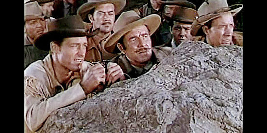 Guy Madison as Miles Archer and Onslow Stevens as artist Grover Johnson scout the Indian camp where the white women are located in The Charge at Feather River (1953)