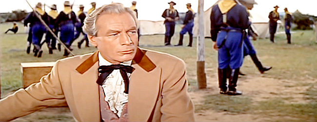 Lowell Gilmore as Indian Commissioner Ward, urging force against the Indians in Comanche (1956)