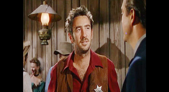 Macdonald Carey as Deputy Lane Travis, butting heads with Johnny Carter yet again in Copper Canyon (1950)