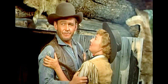 Myron Healy as Hank, a McCord hand, deciding he'd like a little along time with Sierra Nevada Jones (Barbara Stanwyck) in Cattle Queen of Montana (1954)