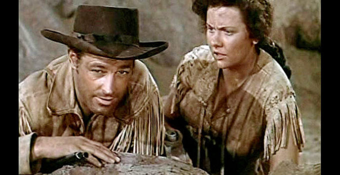 Guy Madison as Miles Archer and Helen Wescott as Ann McKeever in The Charge at Feather River (1953)