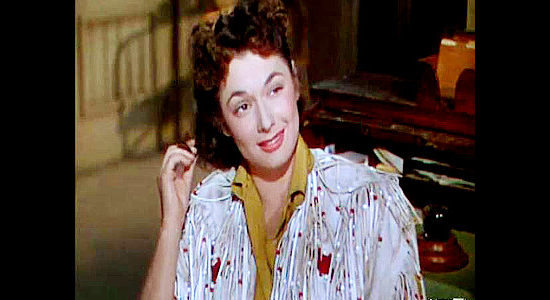 Ruth Roman as Beth Donovan, the woman who sides with Steve Farrell after learning her husband's true motives in Colt .45 (1950)