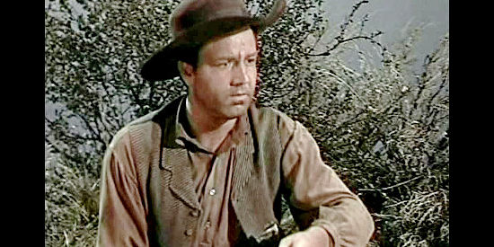 Steve Brodie as Private Ryan, a trooper who's stirred the ire of Sgt. Baker by flirting with his wife in The Charge at Feather River (1953)